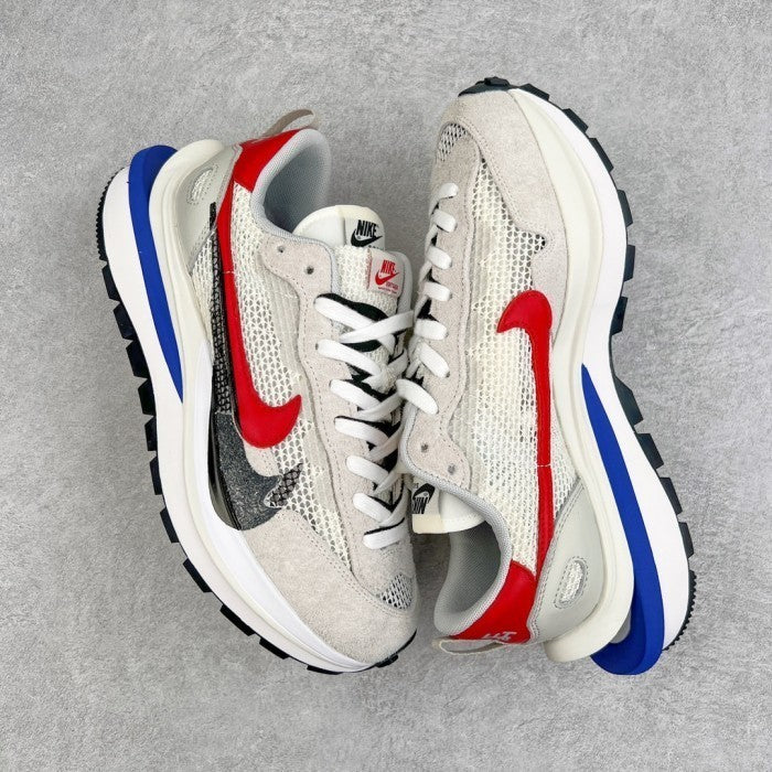 Nike Vaporwaffle sacai Sport Fuschia