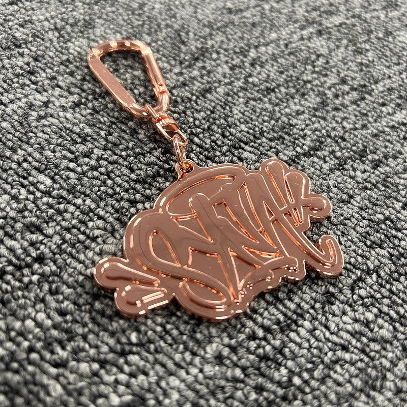 Syna World x Can't Rush Greatness Keyring - Rose Gold