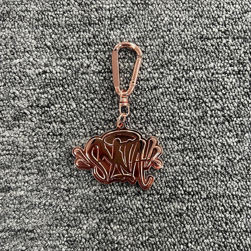 Syna World x Can't Rush Greatness Keyring - Rose Gold