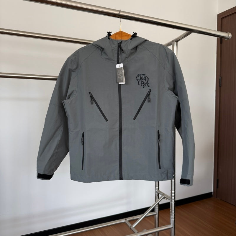 mertra - Monogram Shell Jacket (Grey) - Water Reactive Monogram Pattern Effect