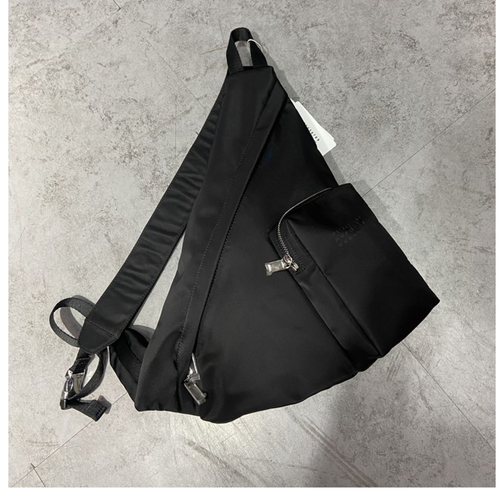MM6 triangular cross body bag