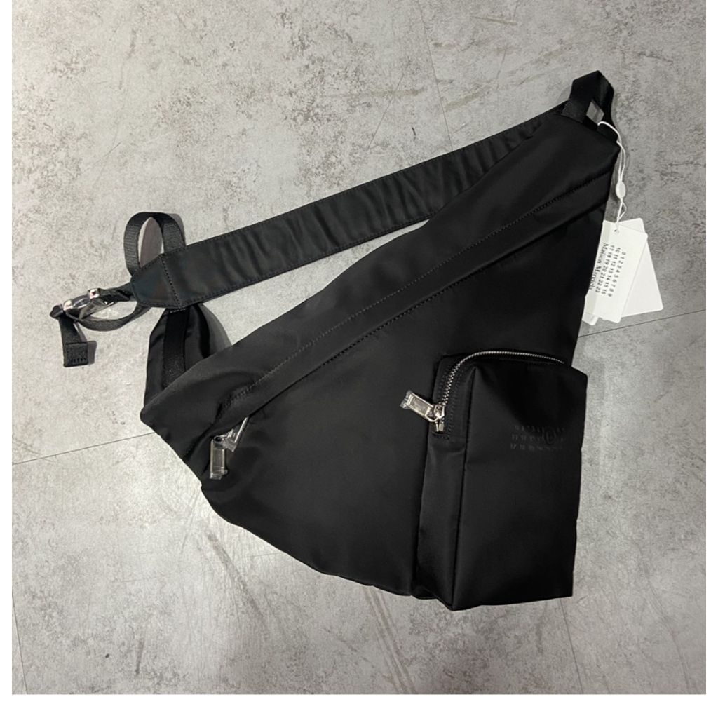 MM6 triangular cross body bag