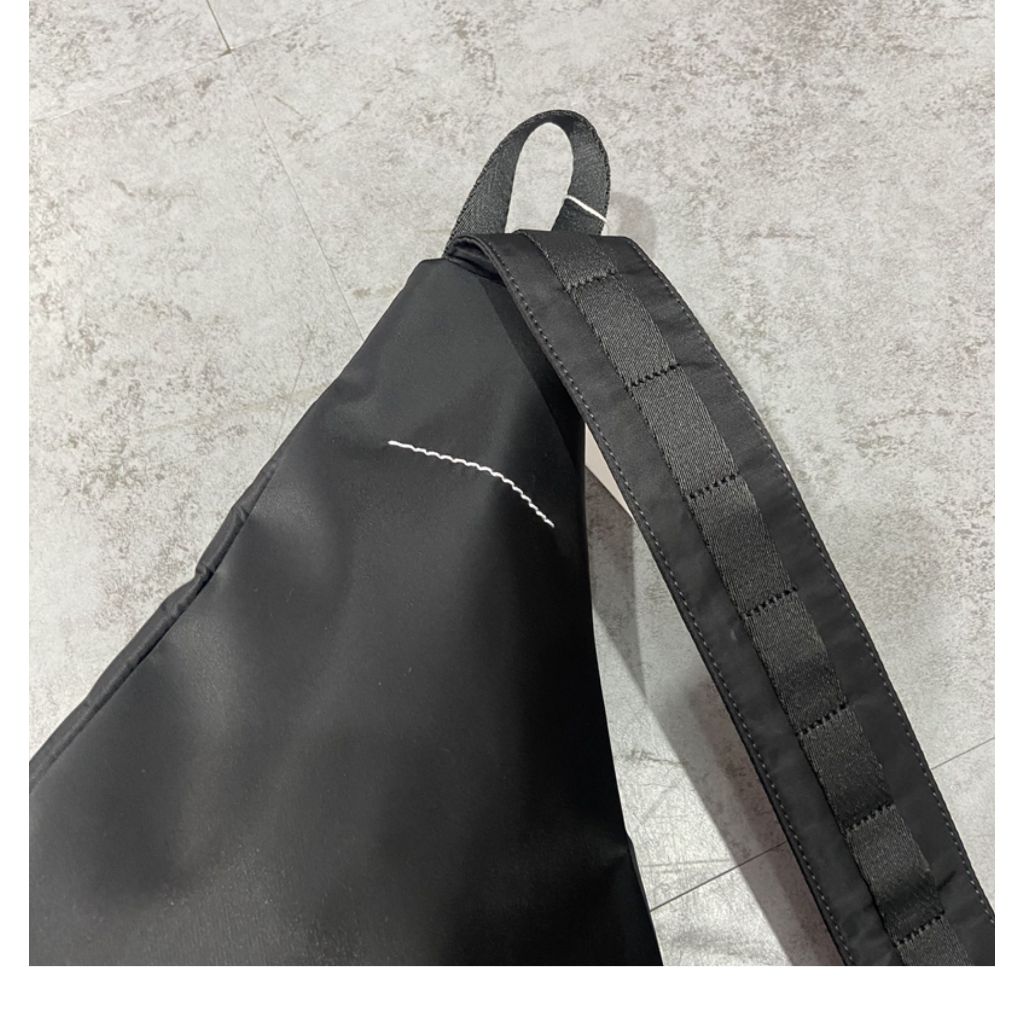 MM6 triangular cross body bag