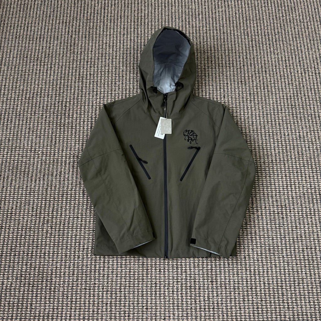mertra -  Monogram Shell Jacket (Brown) - Water Reactive Monogram Pattern Effect