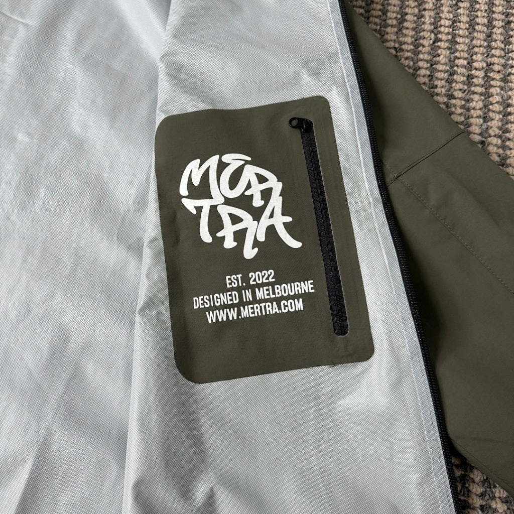 mertra -  Monogram Shell Jacket (Brown) - Water Reactive Monogram Pattern Effect