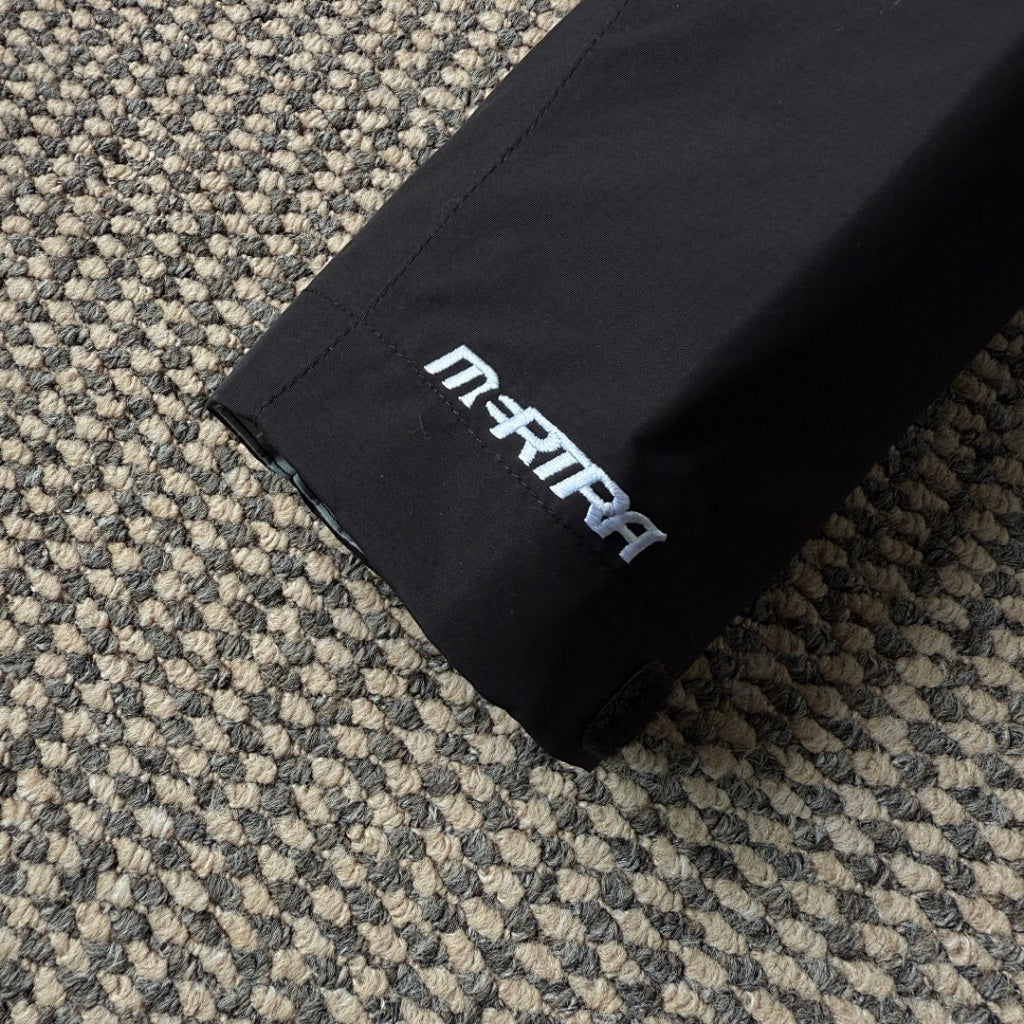 mertra - Monogram Shell Jacket 2.0 - Black - Water sensitive monogram pattern effect