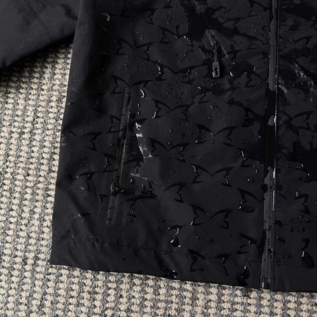 mertra - Monogram Shell Jacket 2.0 - Black - Water sensitive monogram pattern effect