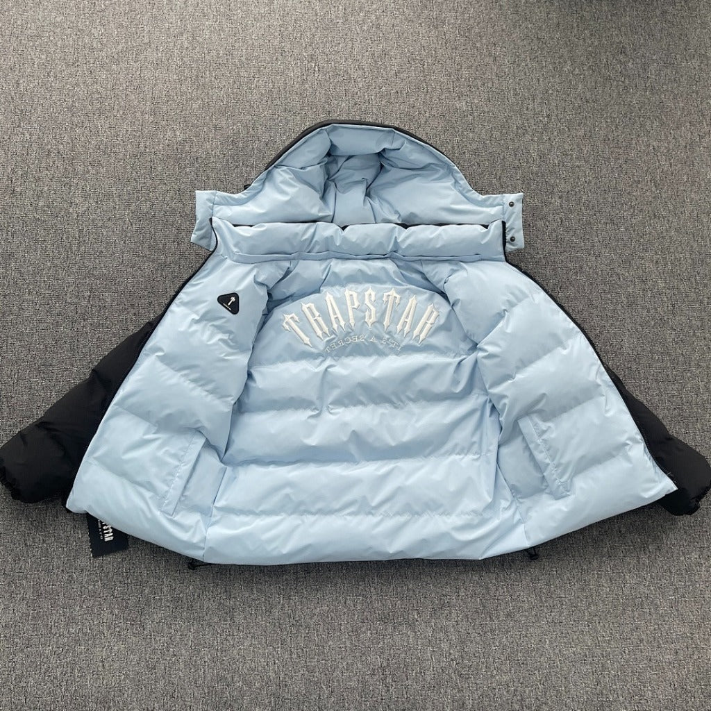 TRAPSTAR IRONGATE ARCH REVERSIBLE PUFFER JACKET AW25- BLACK/ LIGHT BLUE