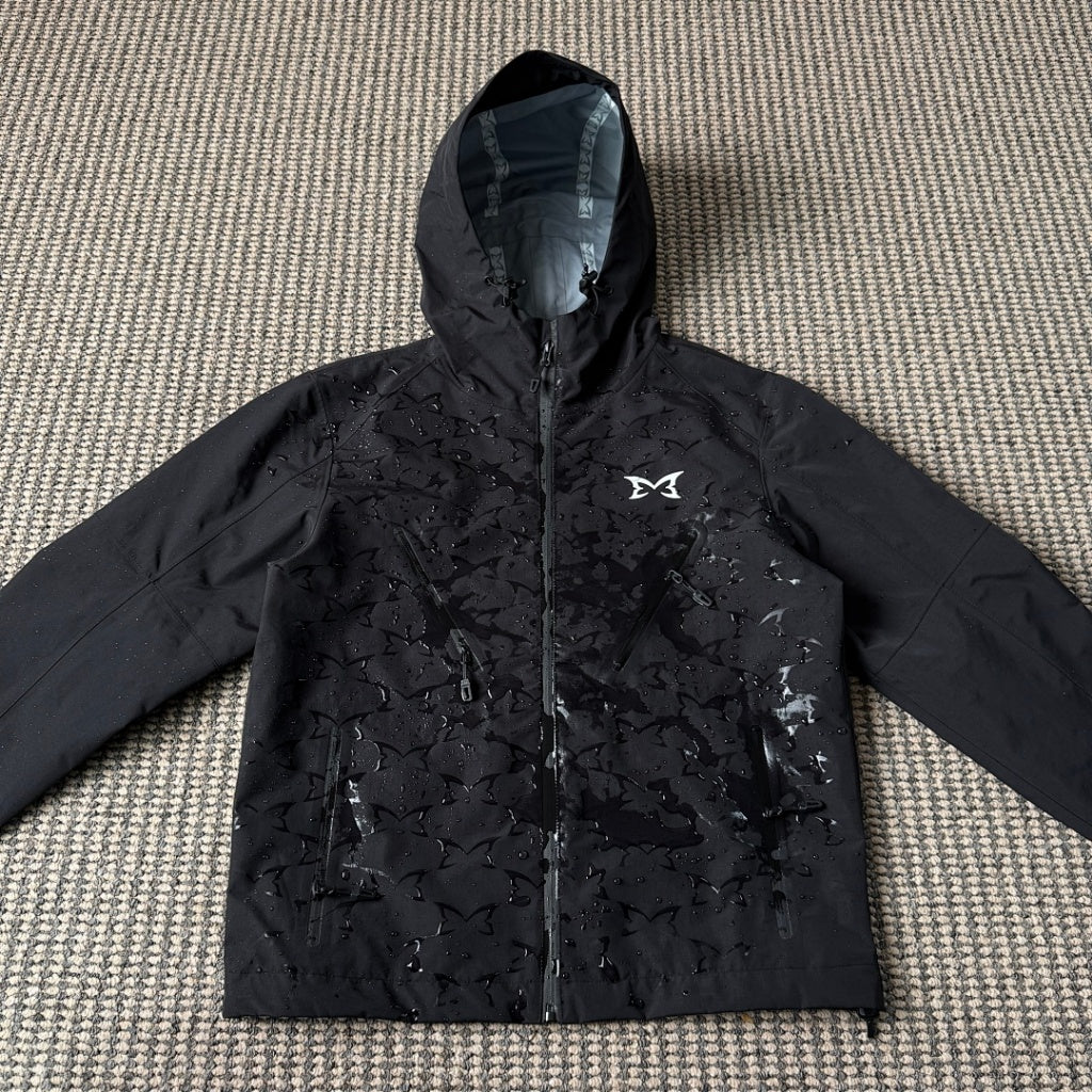 mertra - Monogram Shell Jacket 2.0 - Black - Water sensitive monogram pattern effect